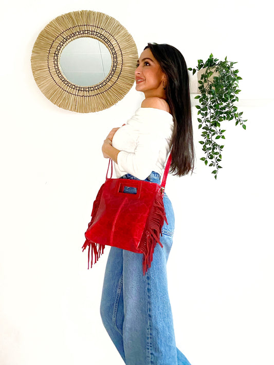 BOLSO BANDOLERA NOMAD PIEL CON FLECOS ROJO